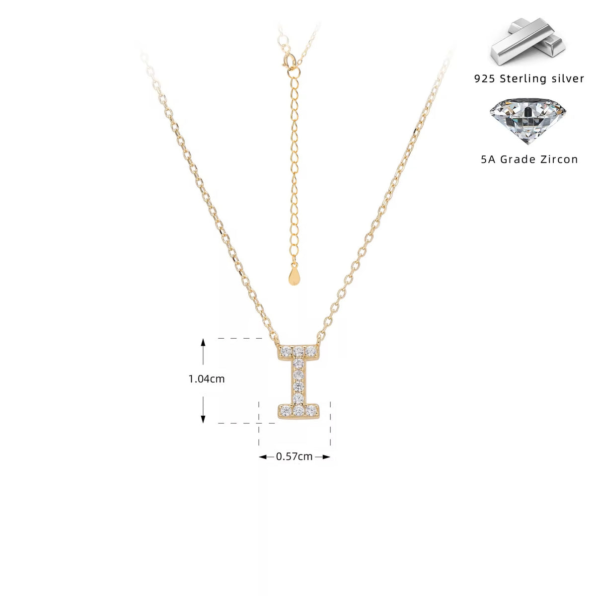 Gold necklace with crystal letter 'I' pendant on a white background