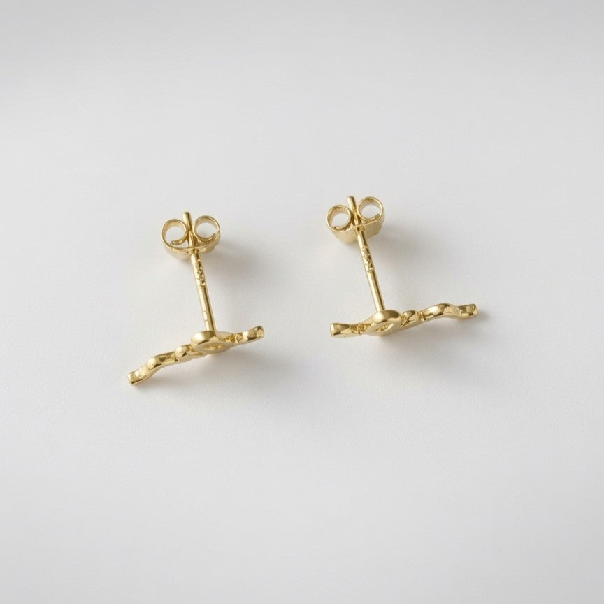 14ct Gold Snake Stud Earring With Butterfly Push Backs Top View on White Background 