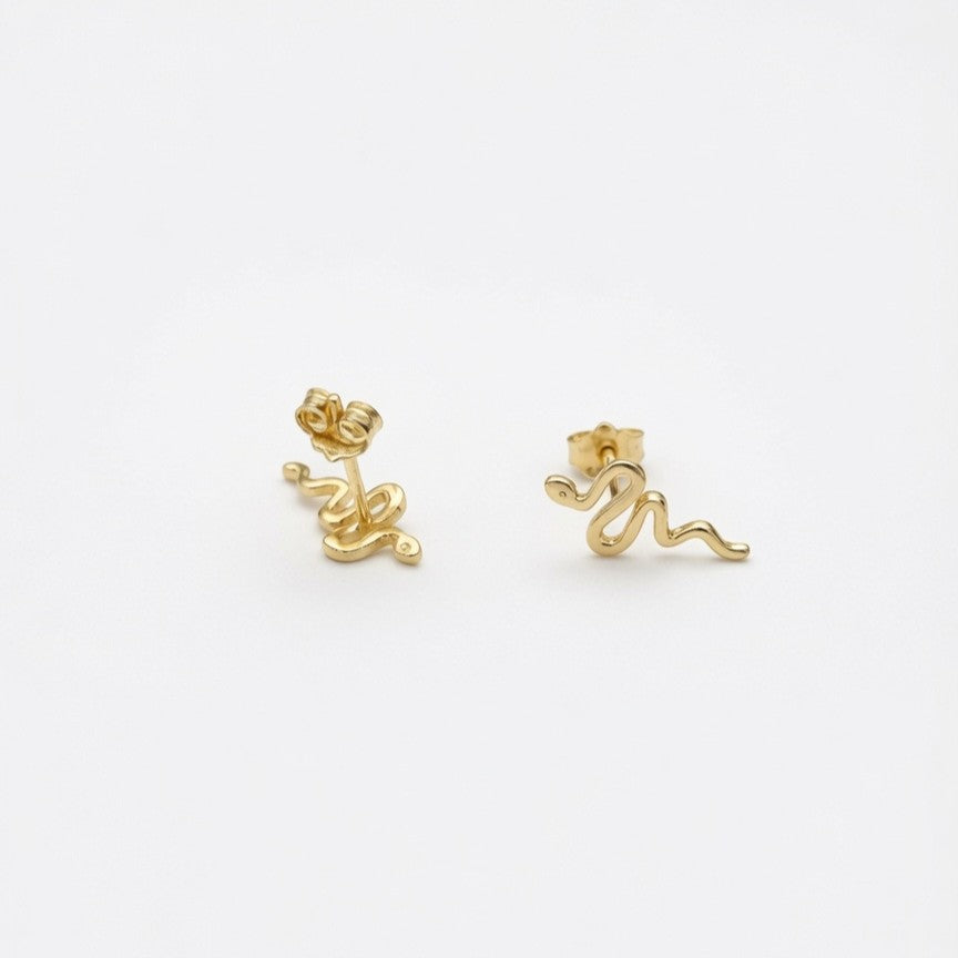 Gold Snake Stud Earring Closed Up View On White Background