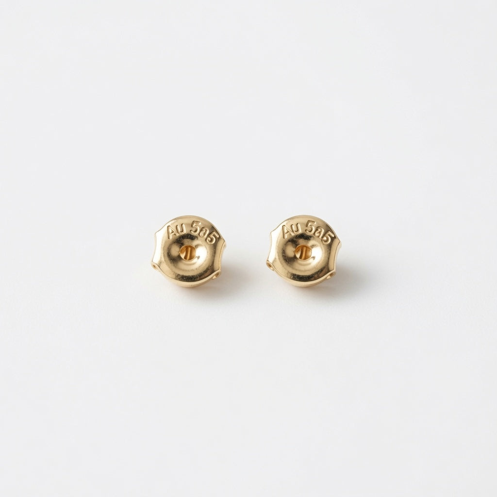 Close up 14ct gold  pair of push backs