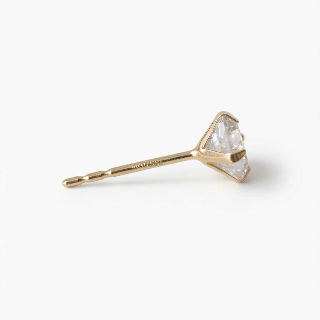 Solid 14ct gold stud earrings with natural zircon