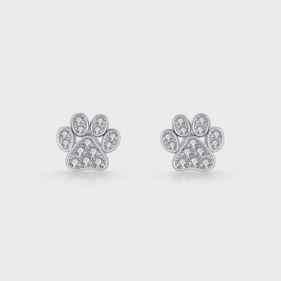 925 sterling silver crystal paw print stud earrings pair on white background Agnes and Simon