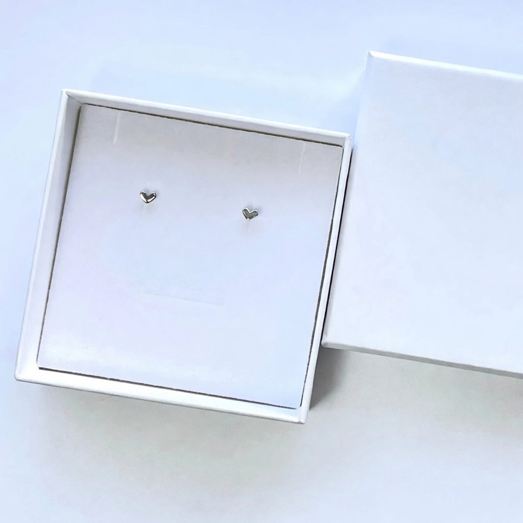 925 sterling silver dainty heart stud earrings presented in white gift box Agnes and Simon
