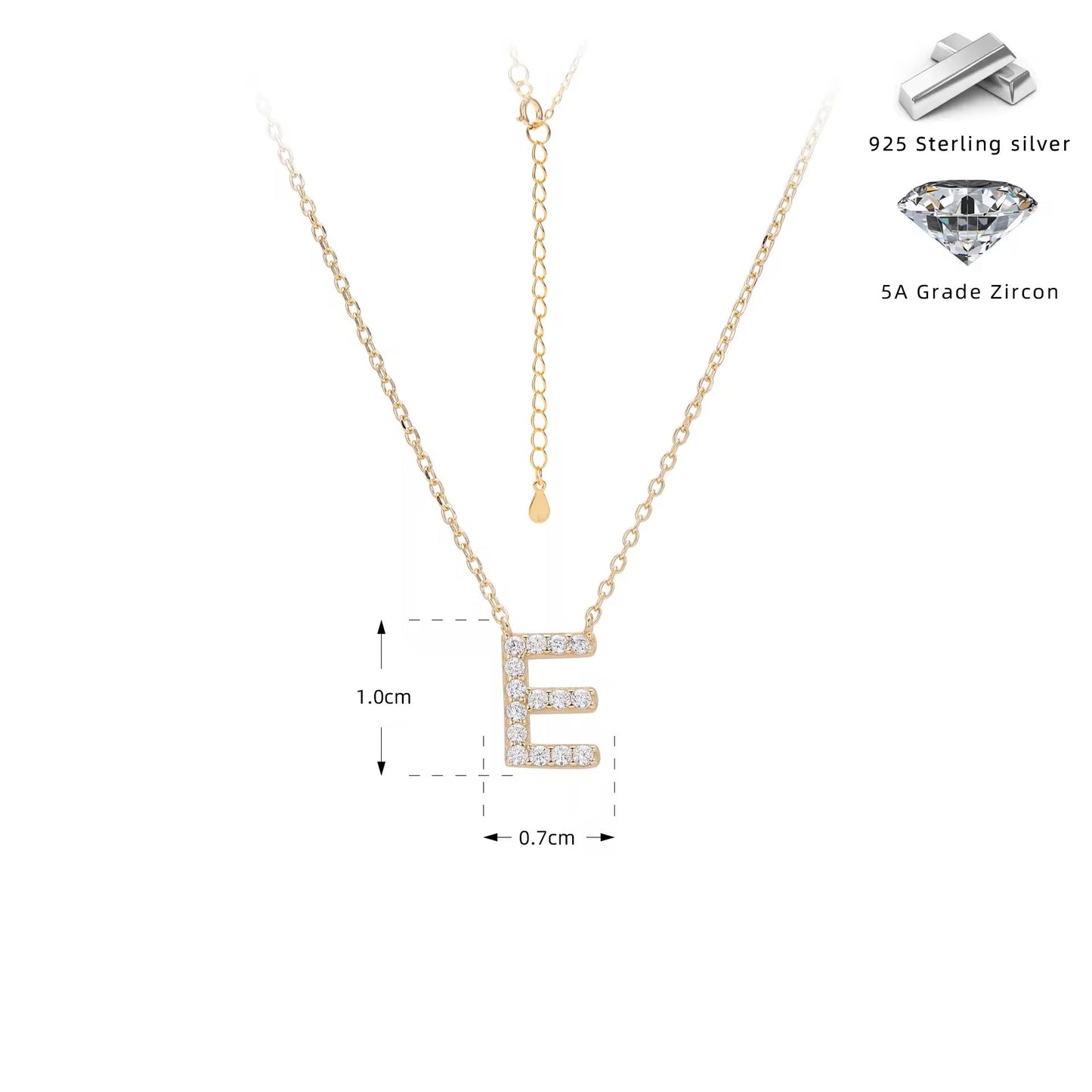 Gold necklace with crystal letter 'E' pendant on a white background
