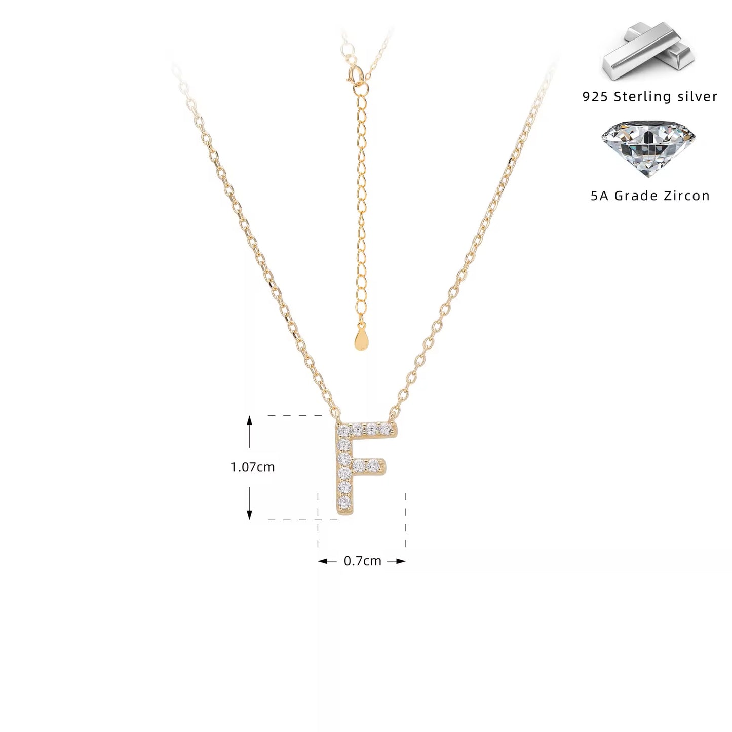 Gold necklace with crystal letter 'F' pendant on a white background