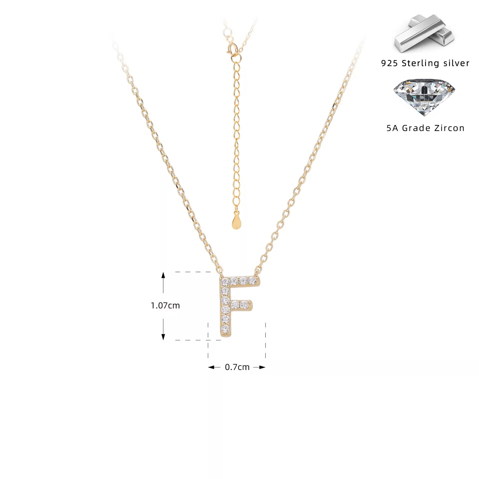 Gold necklace with crystal letter 'F' pendant on a white background