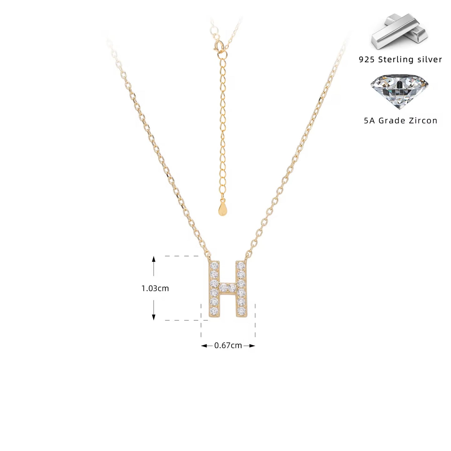 Gold necklace with crystal letter 'H' pendant on a white background
