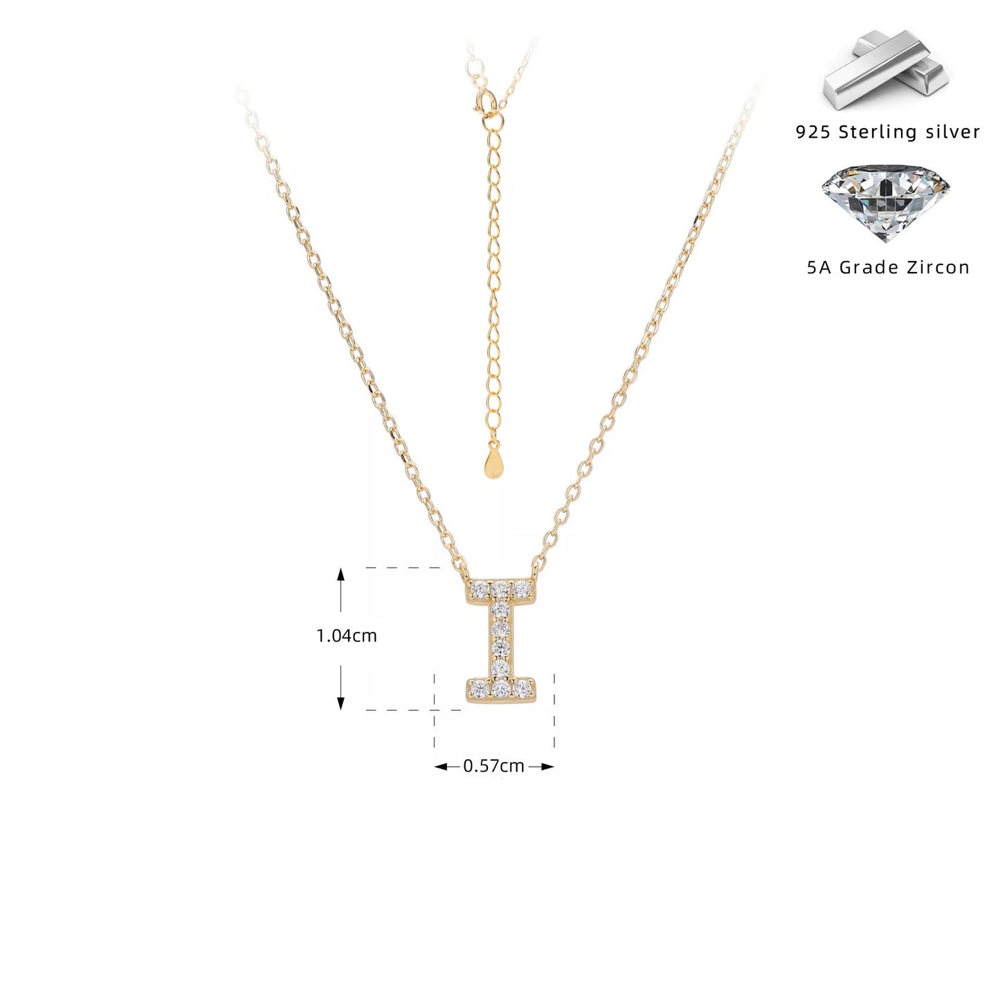 Gold necklace with crystal letter 'I' pendant on a white background