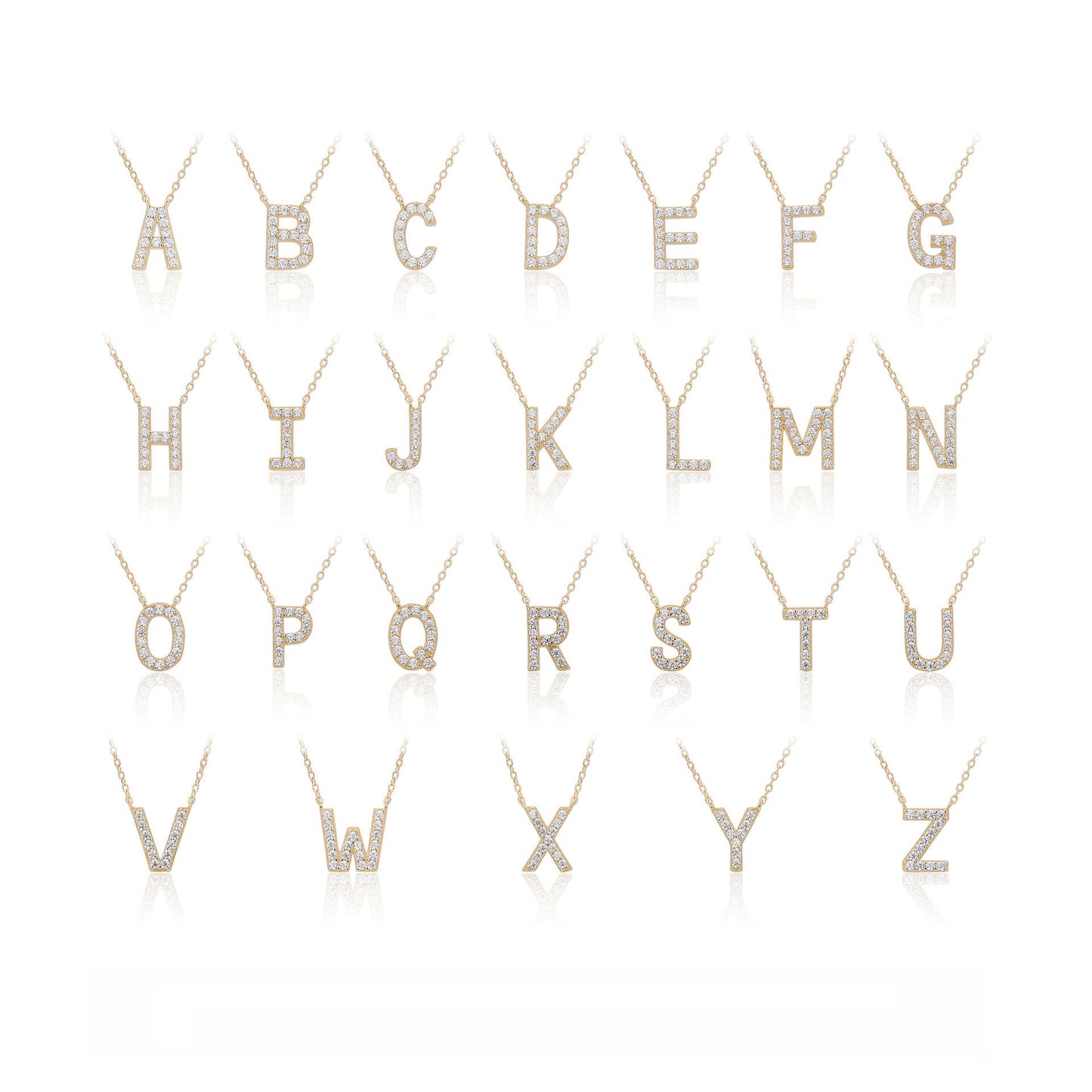 Diamond-studded gold letter necklaces from A to Z on a white background