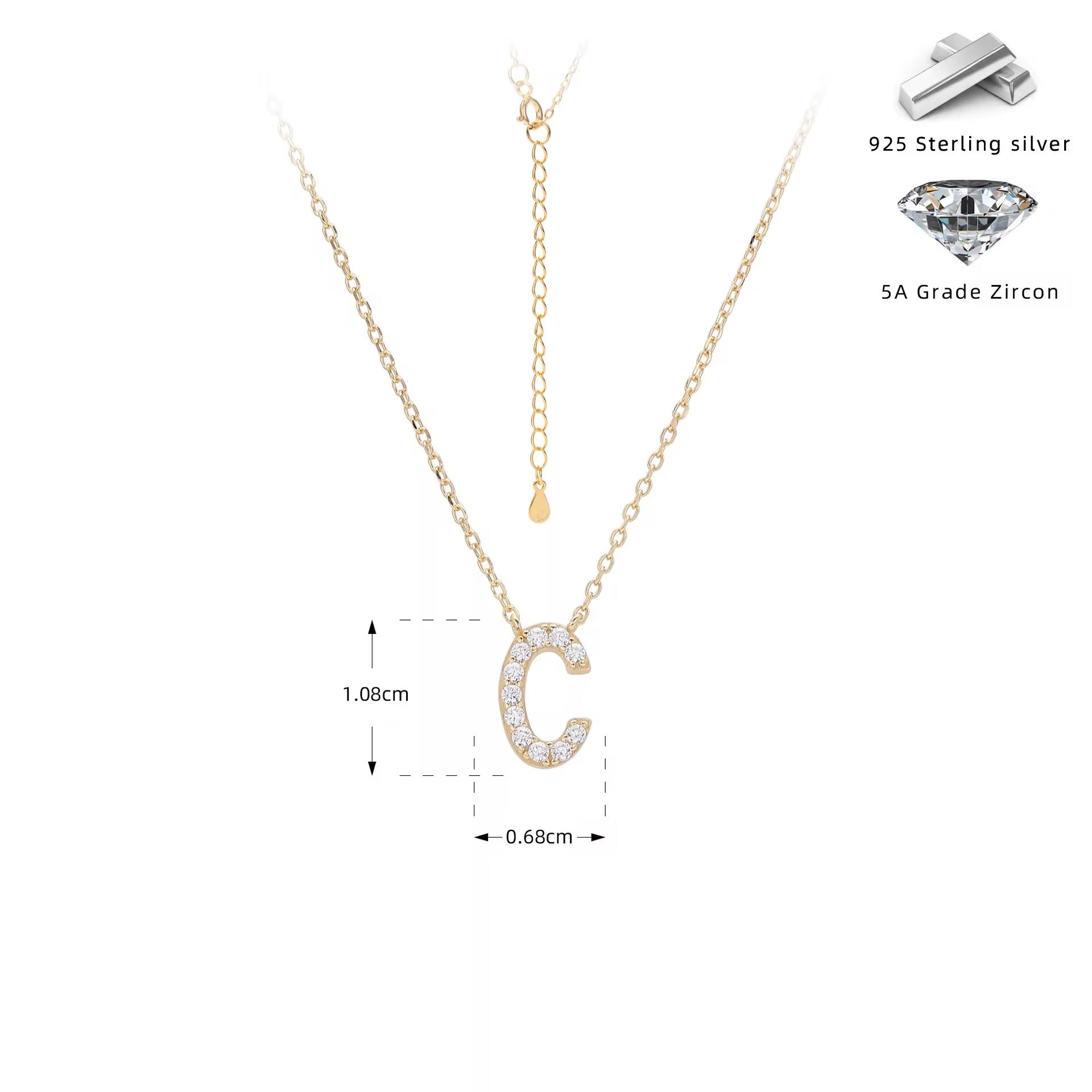 Gold necklace with crystal letter 'C' pendant on a white background