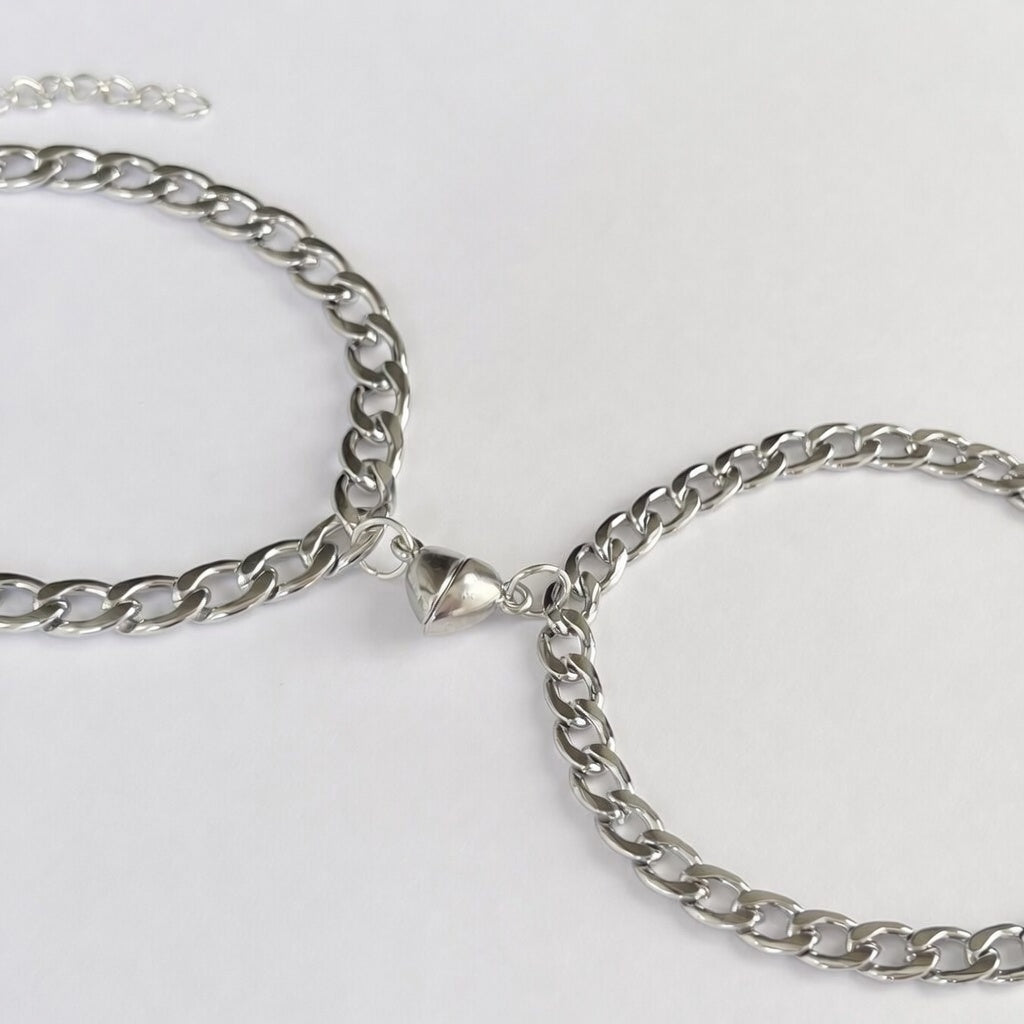 His and hers matching magnetic heart bracelets set by Agnes and Simon